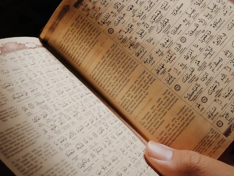 Boy reading Quran